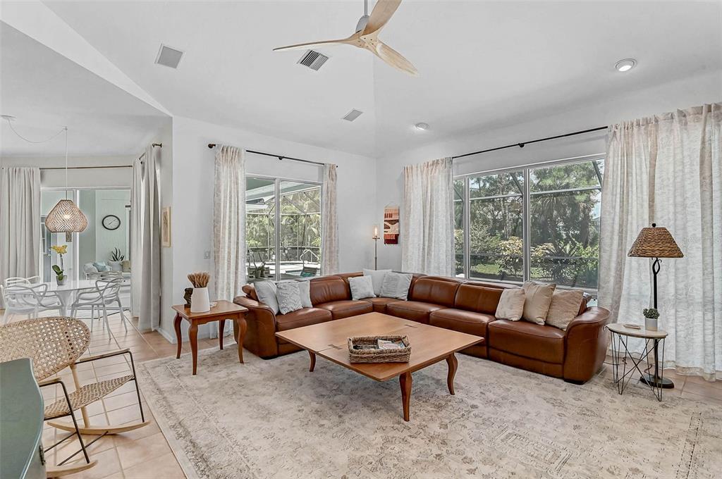 2050 Timucua Trail Nokomis, FL 34275 - Photo 19 of 50 a living room with furniture and a large window