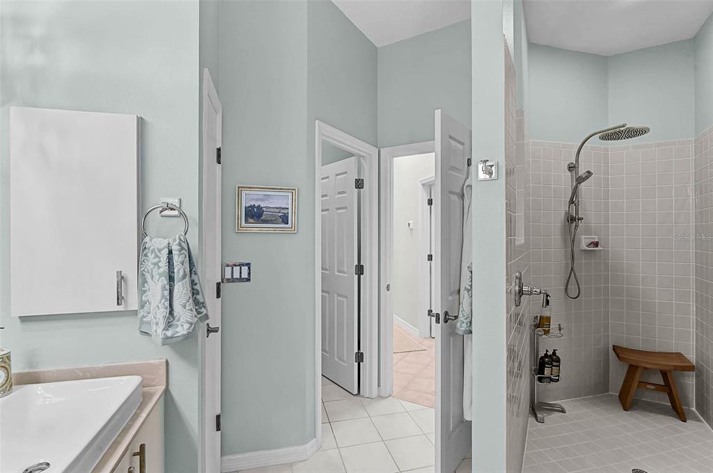 2050 Timucua Trail Nokomis, FL 34275 - Photo 23 of 50 a bathroom with a granite countertop shower mirror and a sink