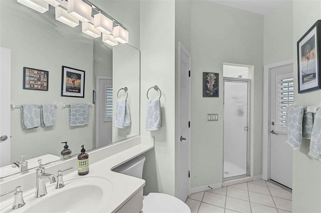 2050 Timucua Trail Nokomis, FL 34275 - Photo 29 of 50 a bathroom with a sink a toilet and shower