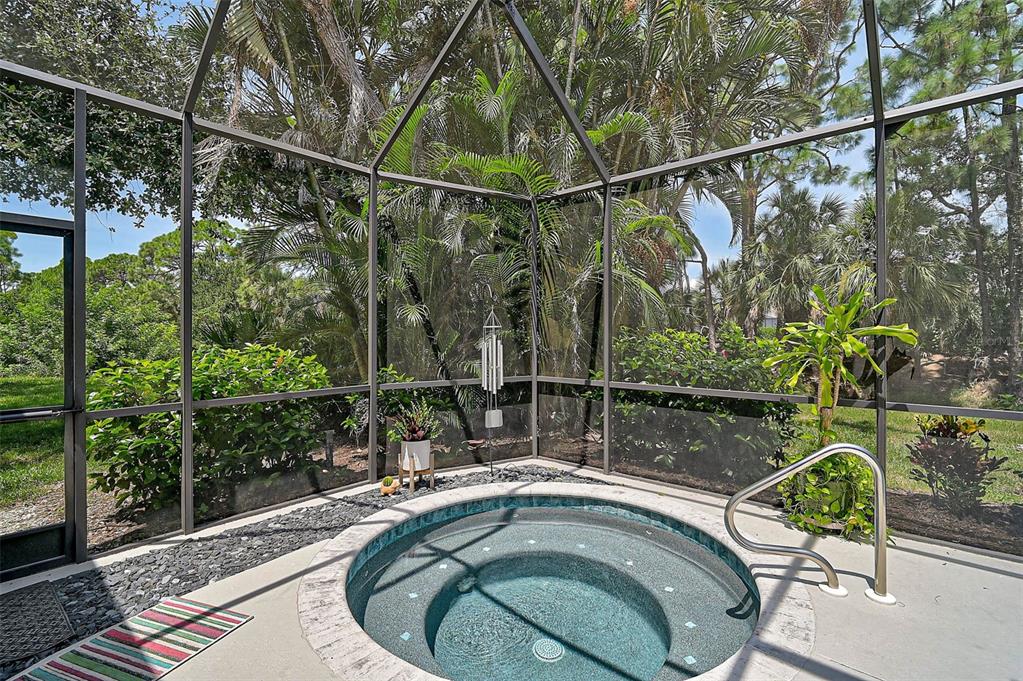 2050 Timucua Trail Nokomis, FL 34275 - Photo 38 of 50 a view of a swimming pool with a patio