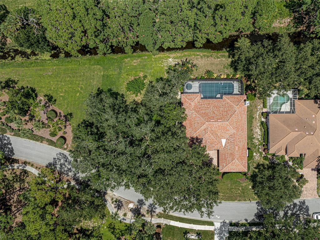 2050 Timucua Trail Nokomis, FL 34275 - Photo 44 of 50 an aerial view of a house with a yard