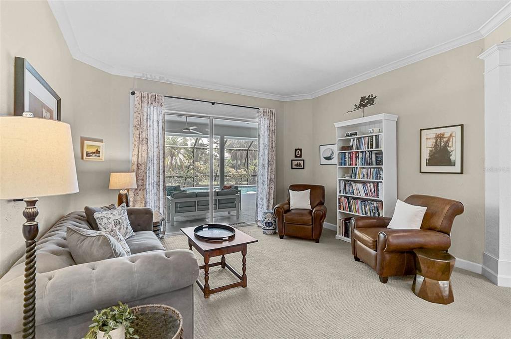 2050 Timucua Trail Nokomis, FL 34275 - Photo 6 of 50 a living room with furniture and a large window