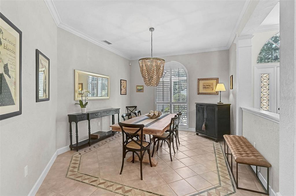 2050 Timucua Trail Nokomis, FL 34275 - Photo 7 of 50 a dining room with furniture and window