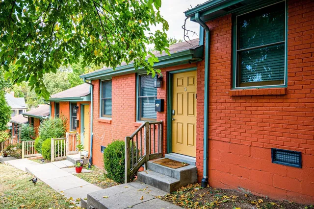 a front view of a house with a porch