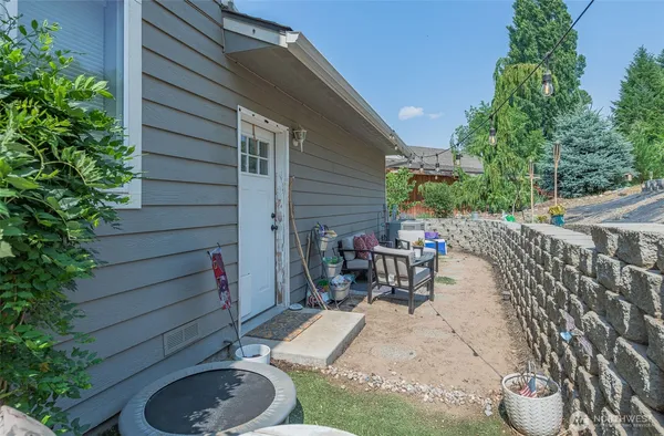 a utility room with sink dryer and washer