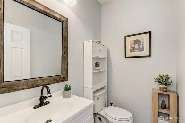 a spacious bedroom with a bed and a window