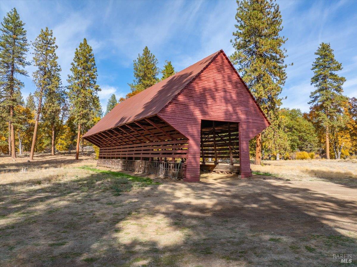 41579 Osprey Road Fall River Mills, CA 96028 - Photo 33 of 67 a view of a house with a yard and tree