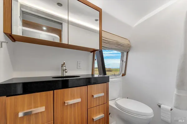 a view of outdoor space with trees all around