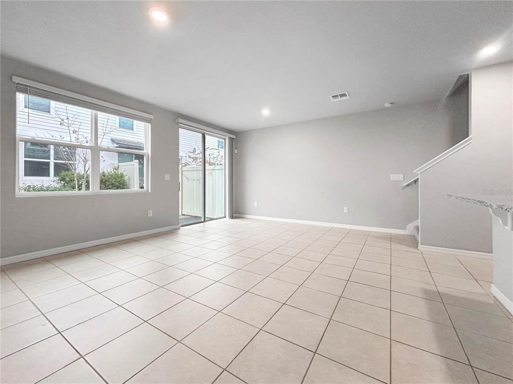 2764 Emory Sound Place Brandon, FL 33510 - Photo 10 of 43 a view of an empty room with a window