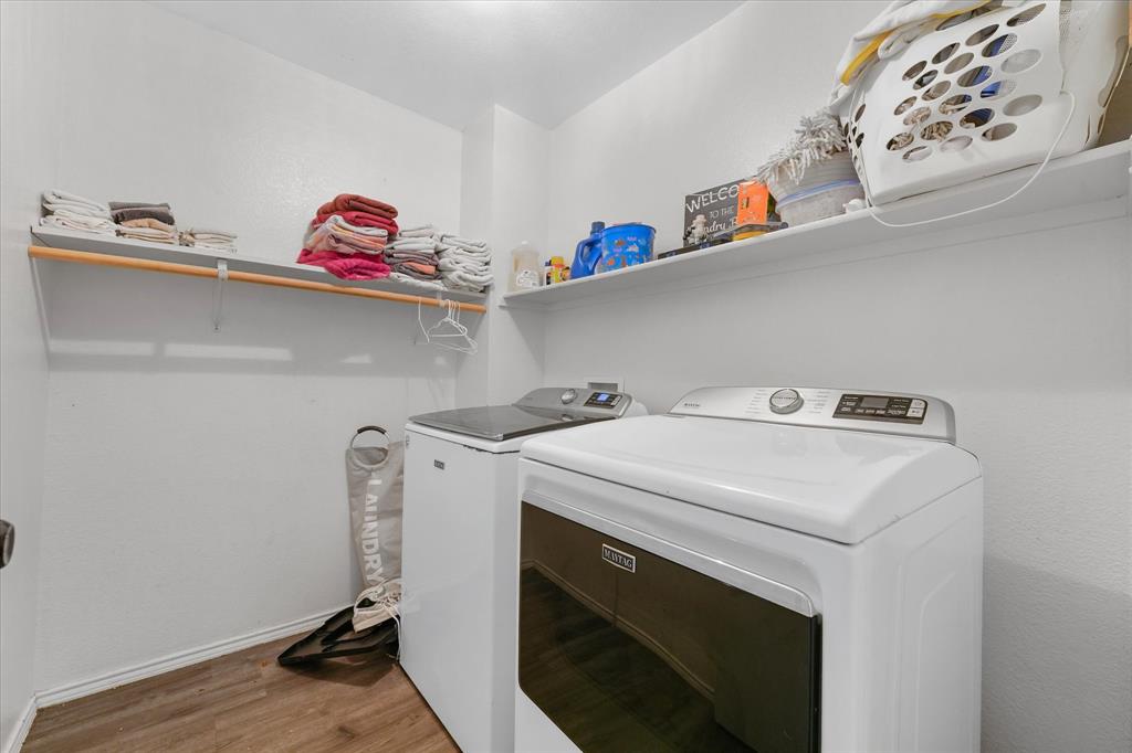 6725 Prairie Fire Road Arlington, TX 76002 - Photo 24 of 31 a utility room with dryer and washer