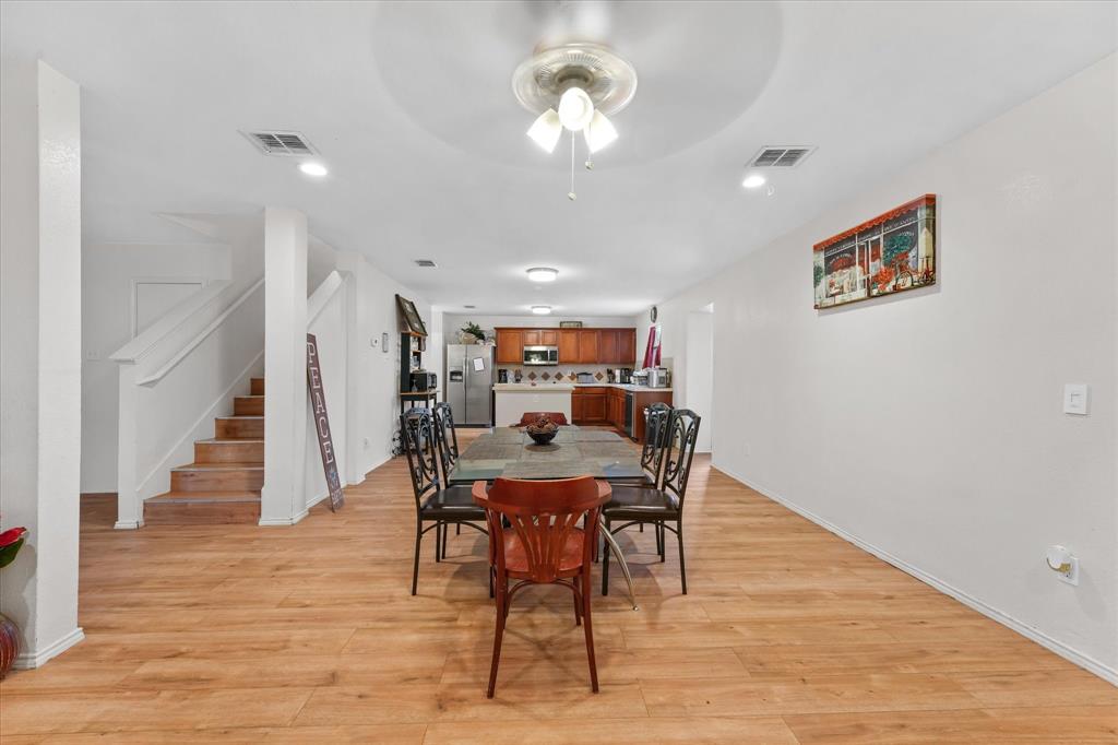 6725 Prairie Fire Road Arlington, TX 76002 - Photo 9 of 31 a view of a dining room with furniture
