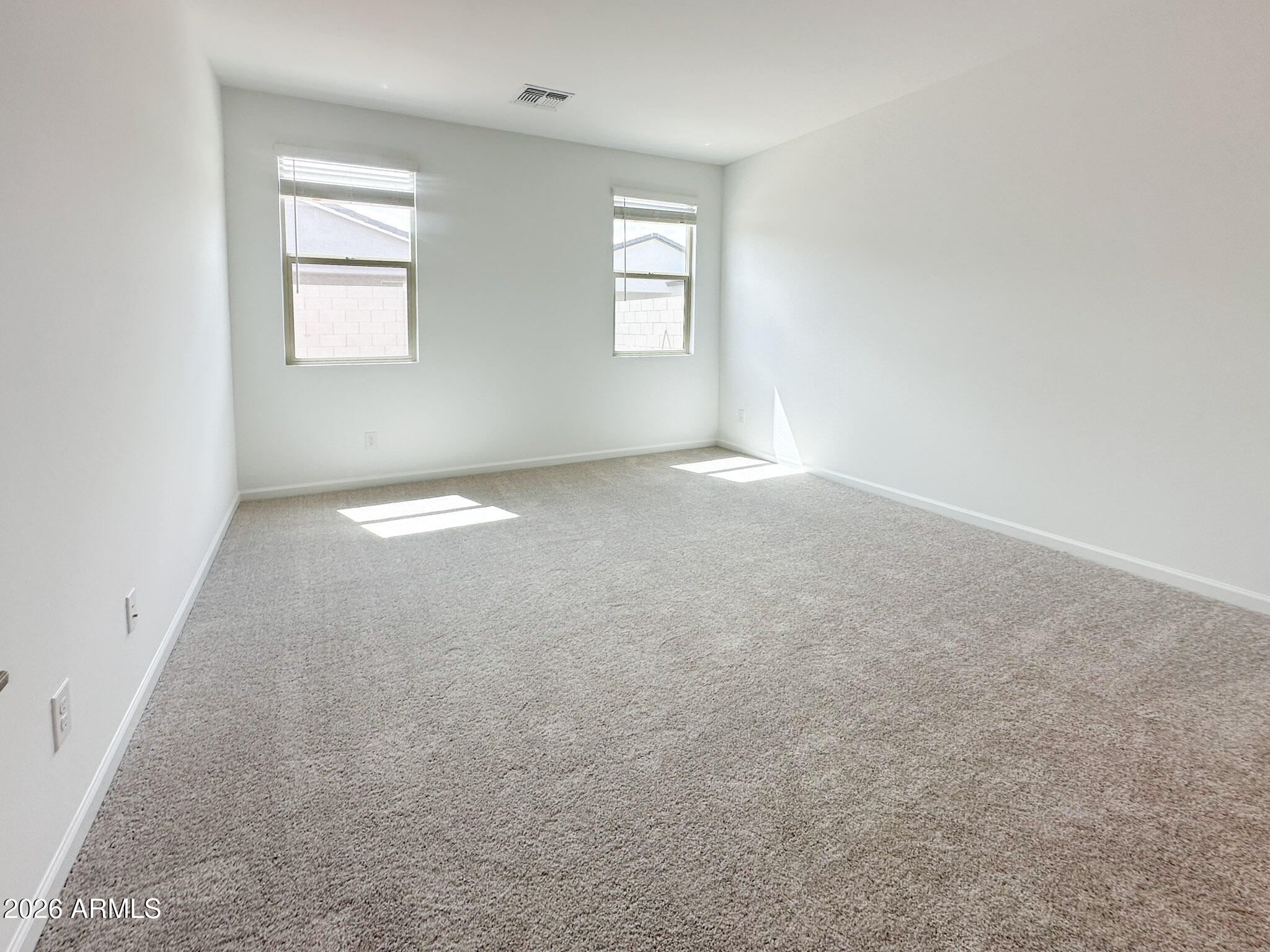 47637 West Moeller Road Maricopa, AZ 85139 - Photo 7 of 19 an empty room with windows