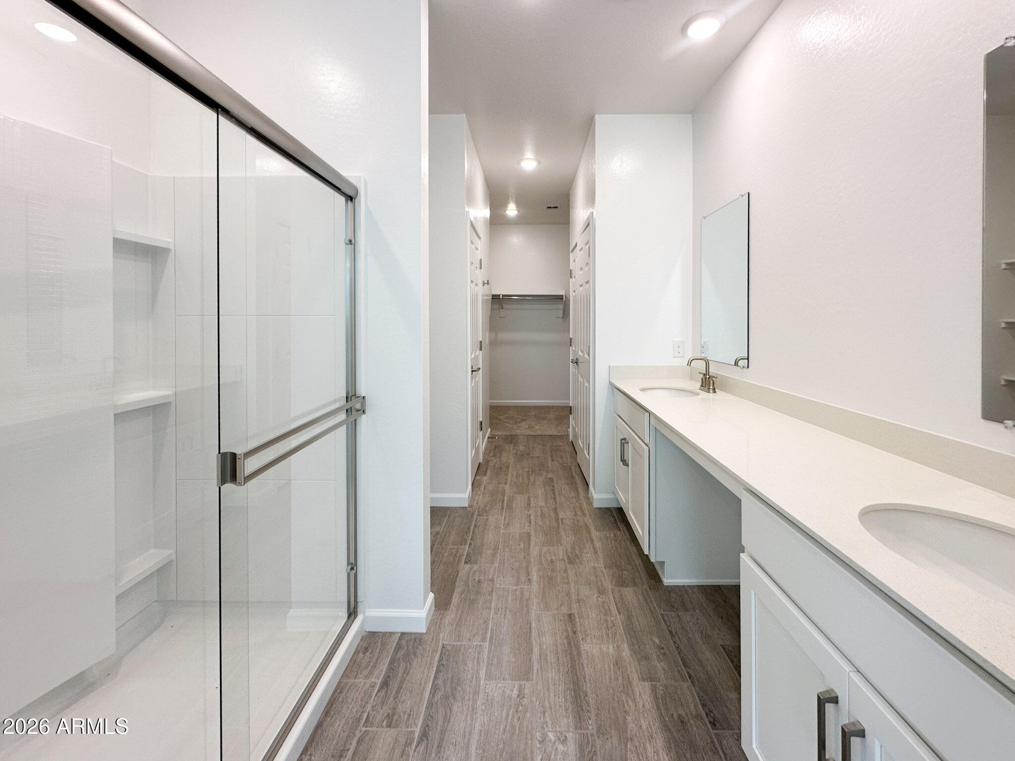 47637 West Moeller Road Maricopa, AZ 85139 - Photo 10 of 19 a bathroom with a double vanity sink and mirror
