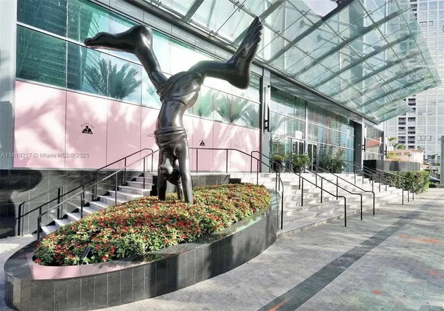 a view of a chairs and table in backyard