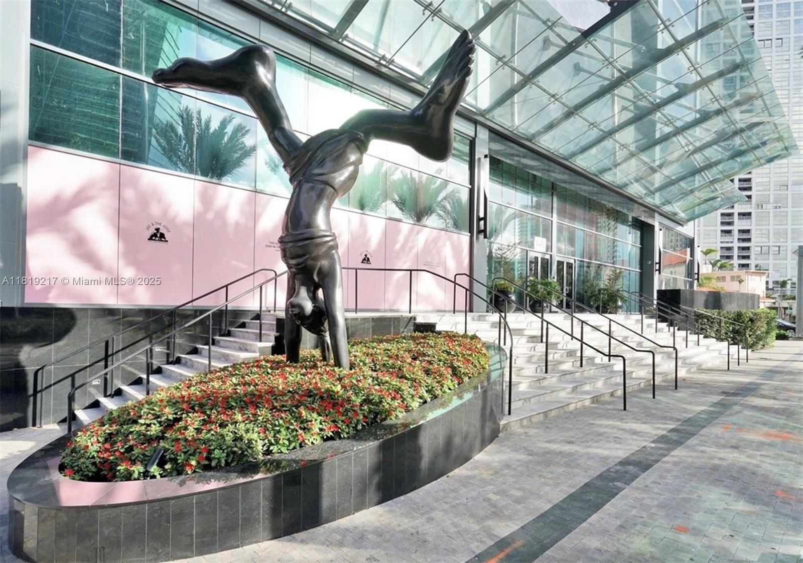 a view of a chairs and table in backyard
