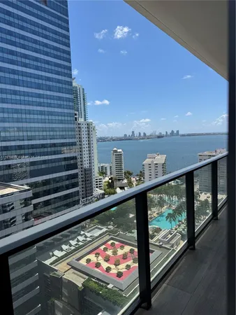 a view of swimming pool from a balcony