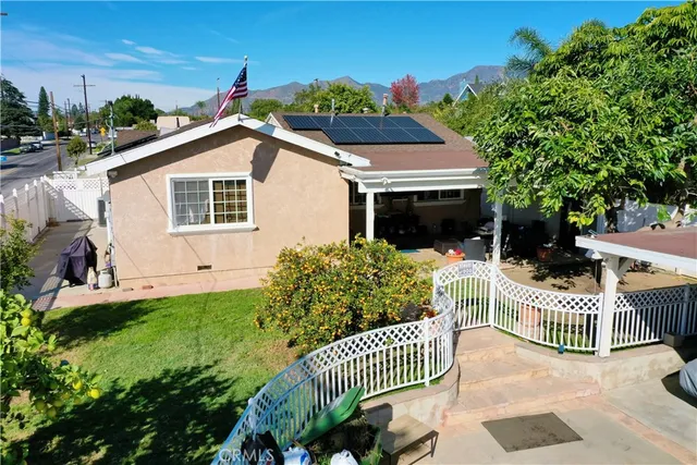 a house view with a garden space
