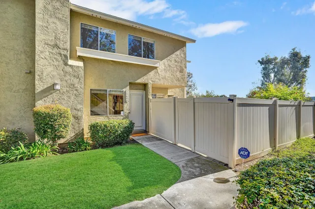 a view of a back yard of the house