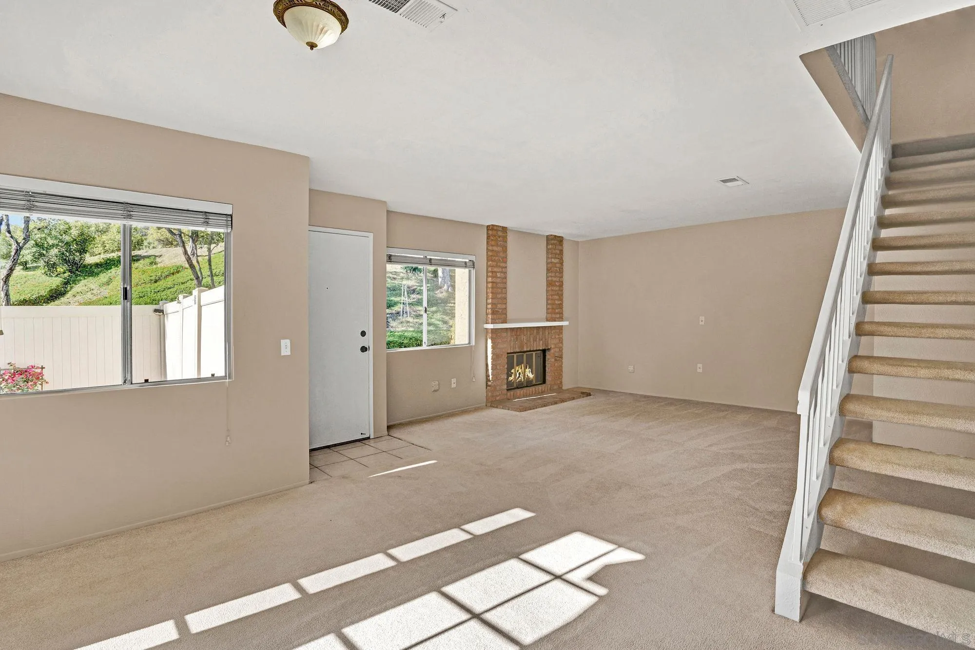 13644 Mulberry Tree Court Poway, CA 92064 - Photo 12 of 37 a view of an empty room with a window