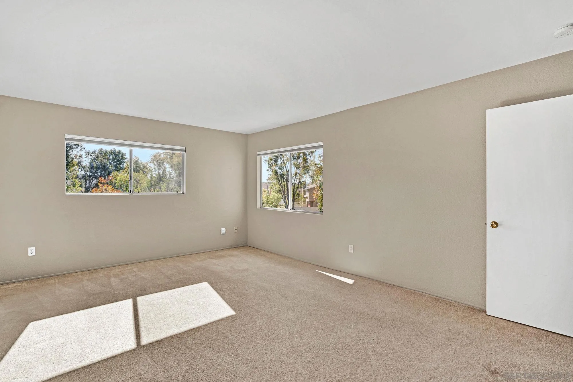 13644 Mulberry Tree Court Poway, CA 92064 - Photo 18 of 37 a view of an empty room with windows
