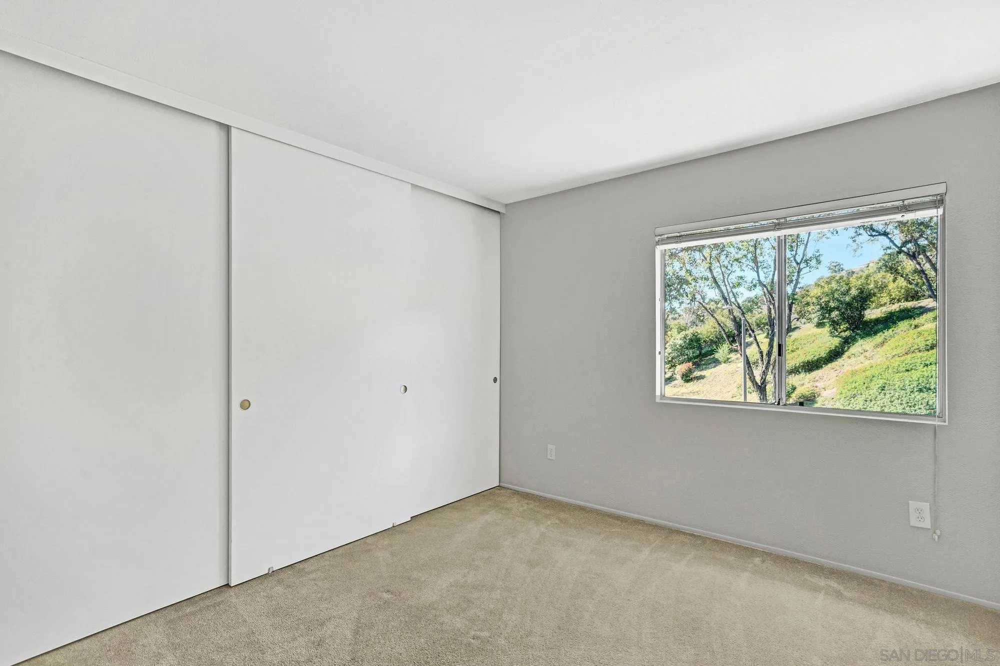 13644 Mulberry Tree Court Poway, CA 92064 - Photo 20 of 37 an empty room with windows