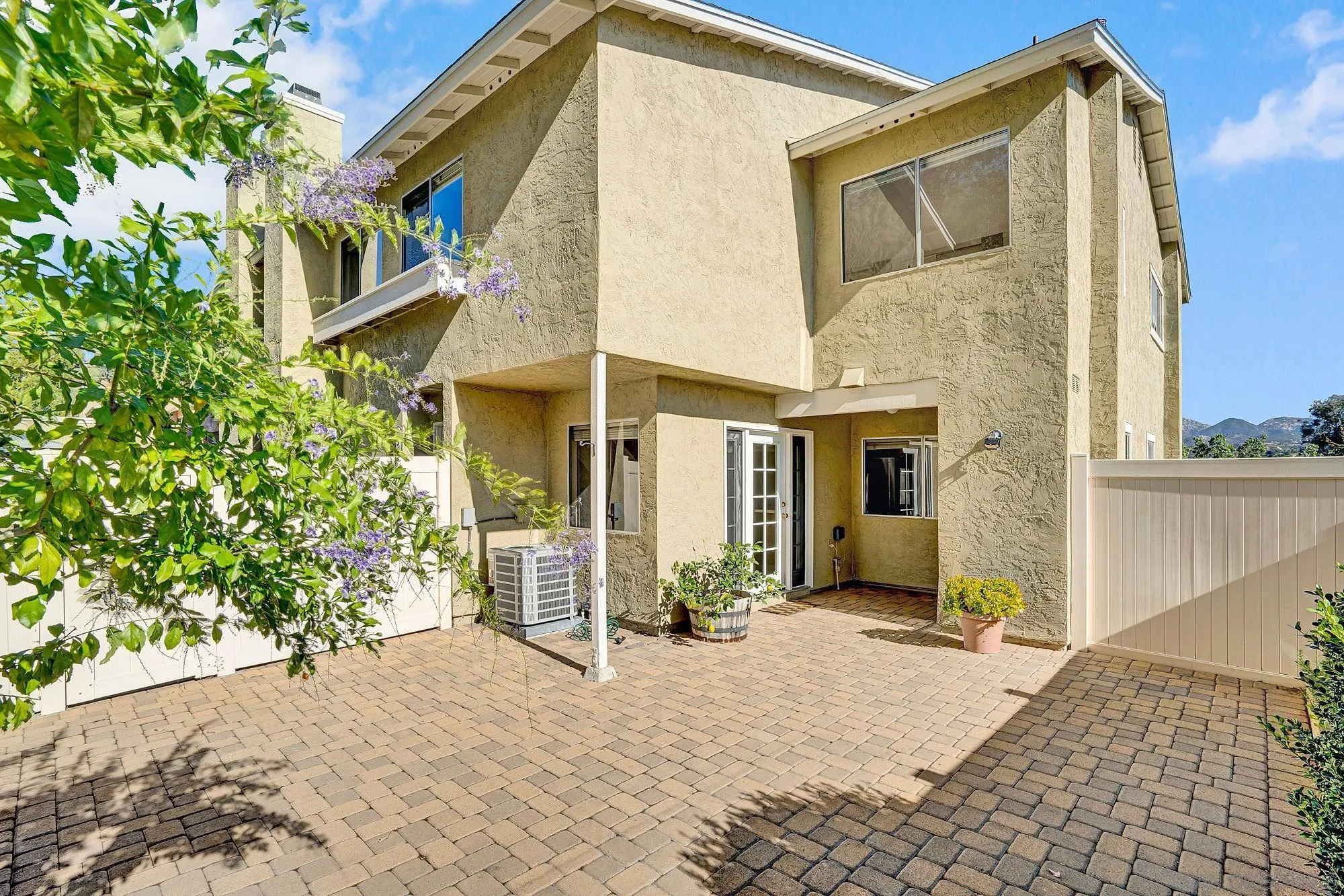 13644 Mulberry Tree Court Poway, CA 92064 - Photo 27 of 37 a view of a house with a yard and lawn chairs