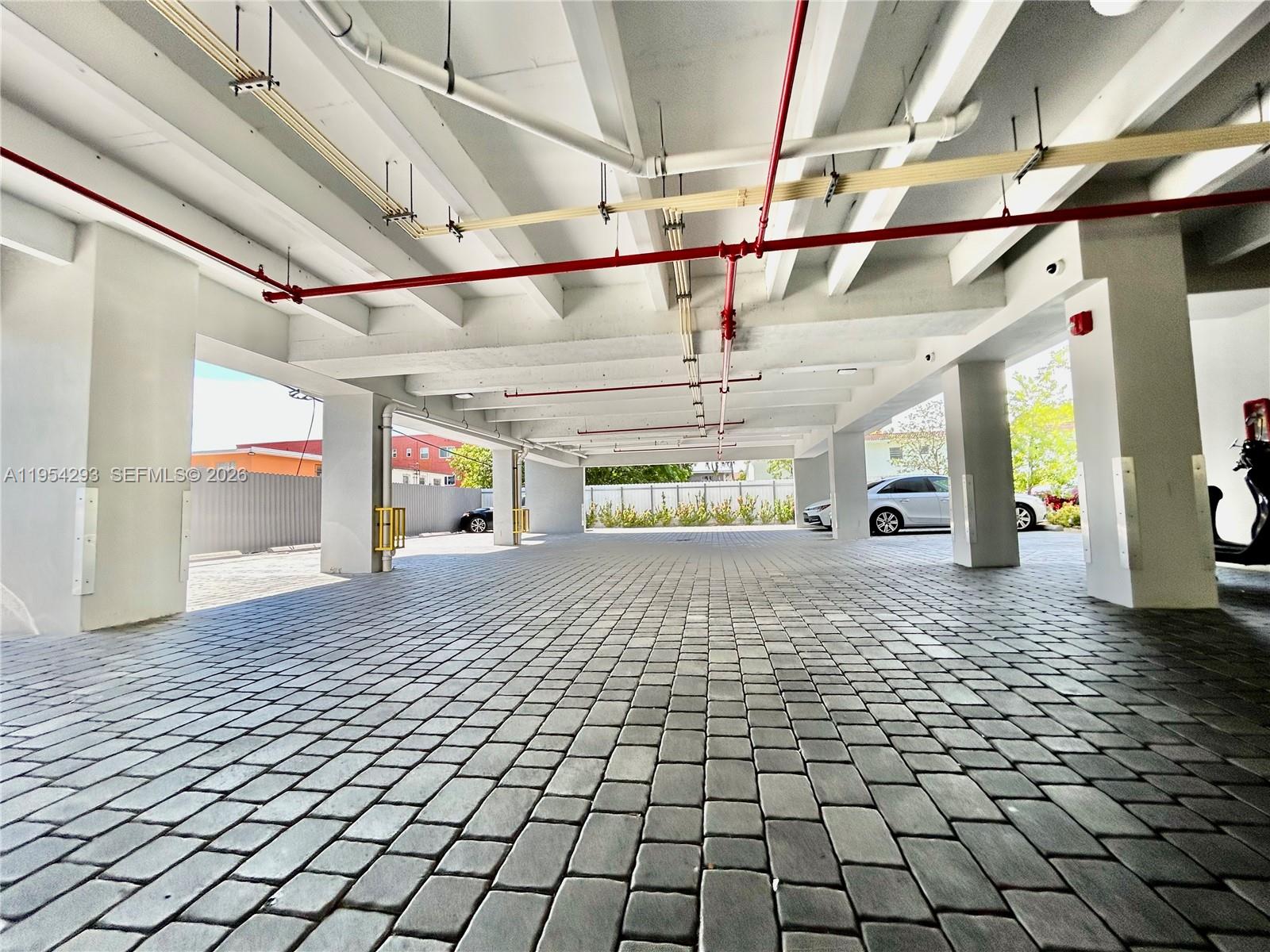 836 Southwest 2nd Street, Unit 202 Miami, FL 33130 - Photo 32 of 36 a view of a water heater room