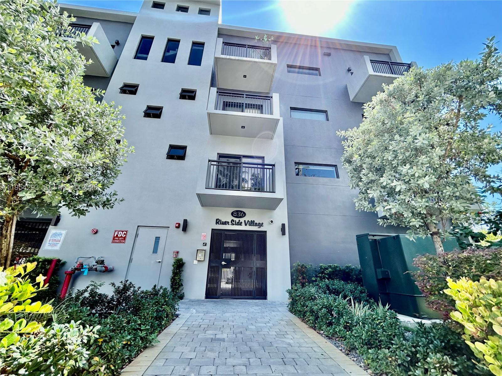 836 Southwest 2nd Street, Unit 202 Miami, FL 33130 - Photo 36 of 36 an aerial view of a house with outdoor space