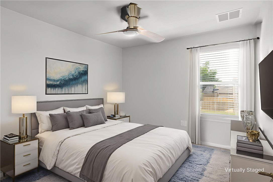 445 Shiner Lane Georgetown, TX 78626 - Photo 28 of 35 a bedroom with bed and window