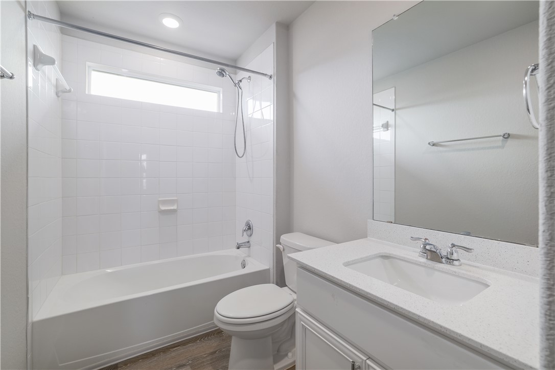 445 Shiner Lane Georgetown, TX 78626 - Photo 31 of 35 a bathroom with a sink toilet and shower