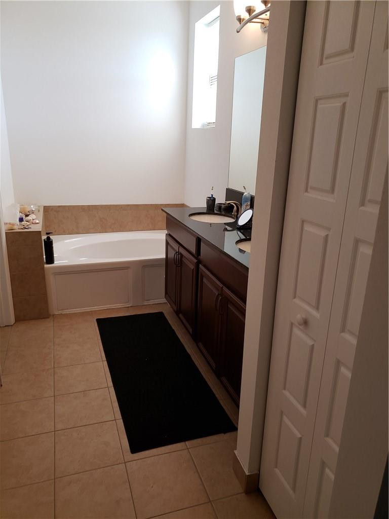 Undisclosed Address Miami, FL 33179 - Photo 11 of 24 a kitchen with a sink and a stove top oven