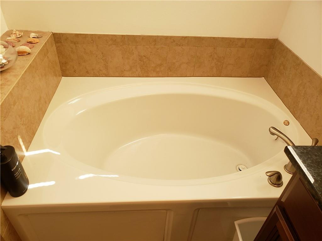 Undisclosed Address Miami, FL 33179 - Photo 13 of 24 a view of a bathtub in a bathroom