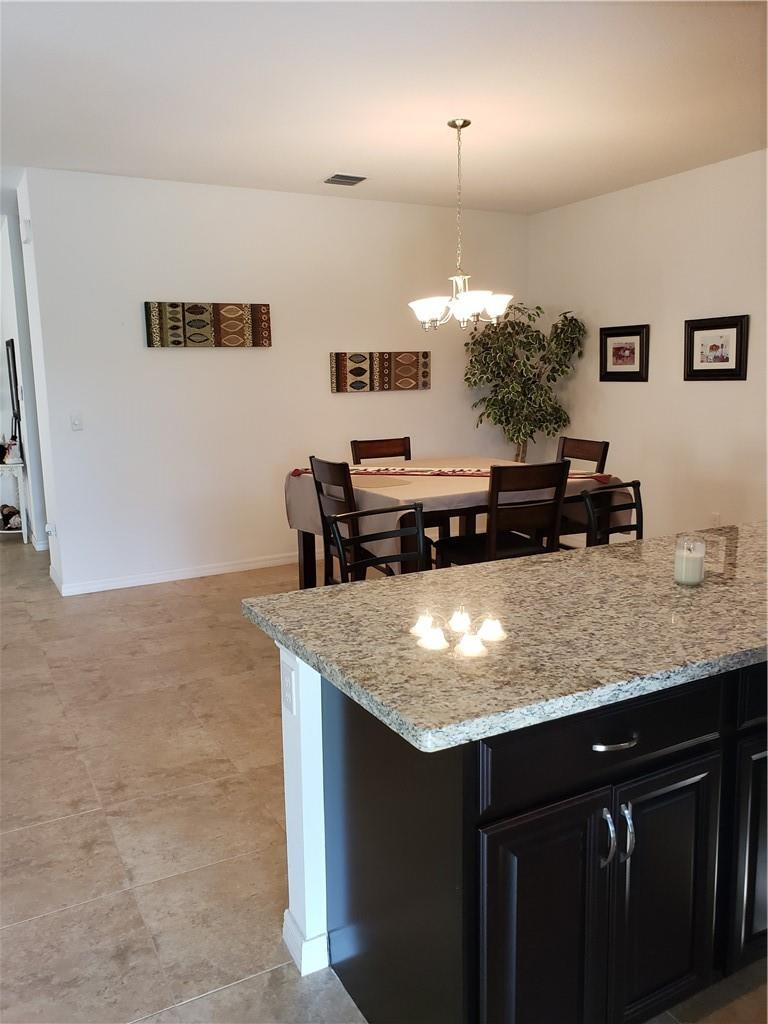Undisclosed Address Miami, FL 33179 - Photo 8 of 24 a kitchen with a counter space a sink and cabinets