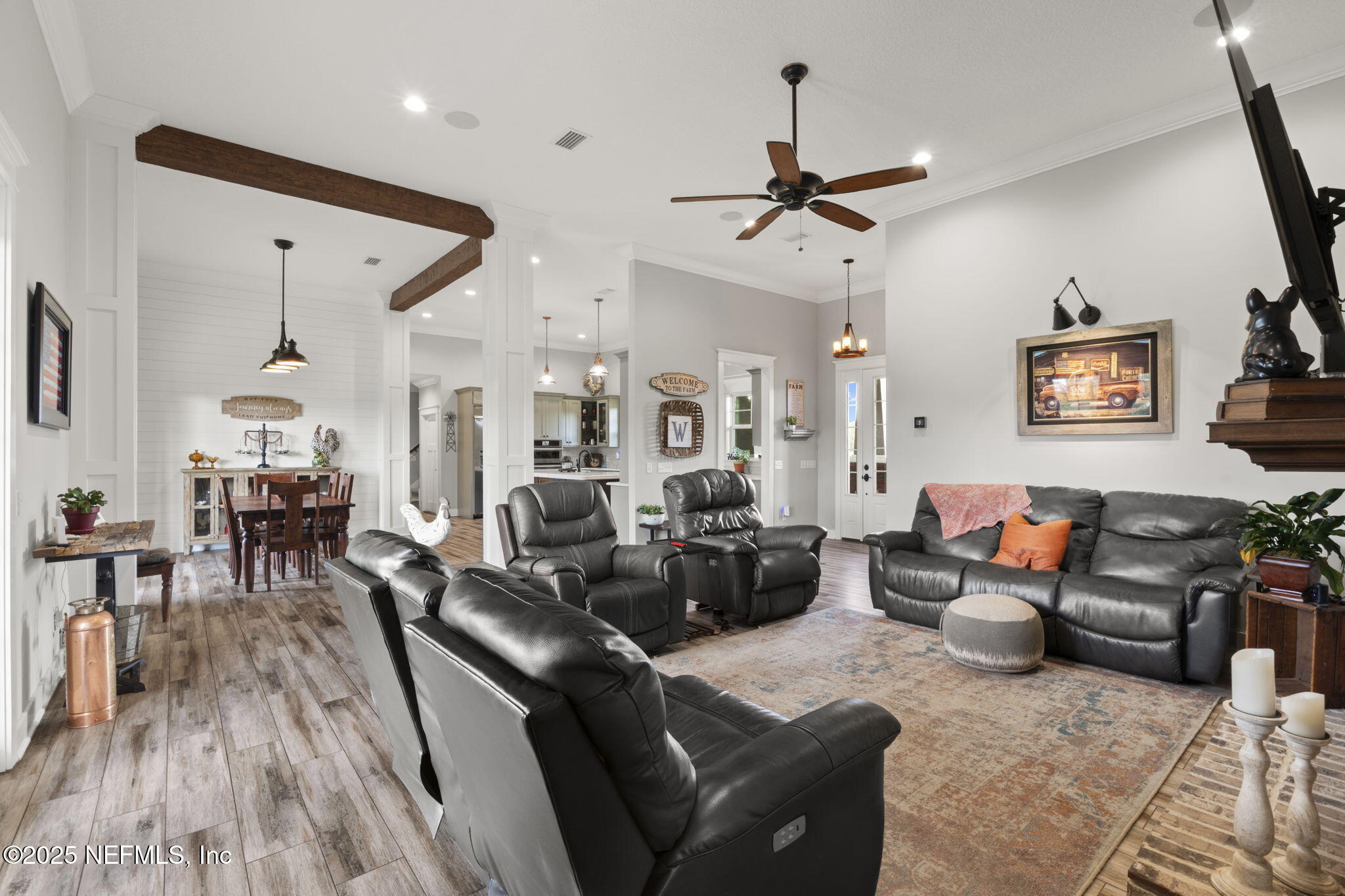 54515 Wildlife Way Callahan, FL 32011 - Photo 29 of 90 a living room with furniture and wooden floor