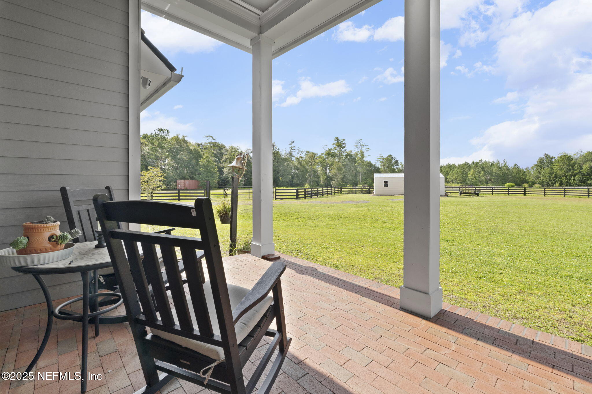 54515 Wildlife Way Callahan, FL 32011 - Photo 51 of 90 a view of a city from a balcony with furniture