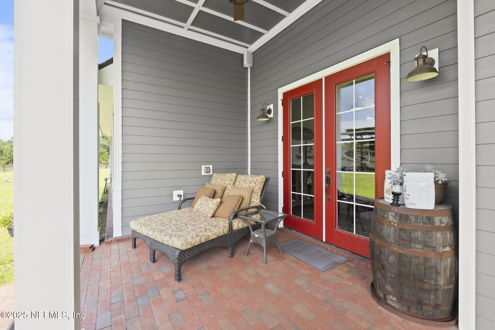 54515 Wildlife Way Callahan, FL 32011 - Photo 53 of 90 a bench sitting in front of a door