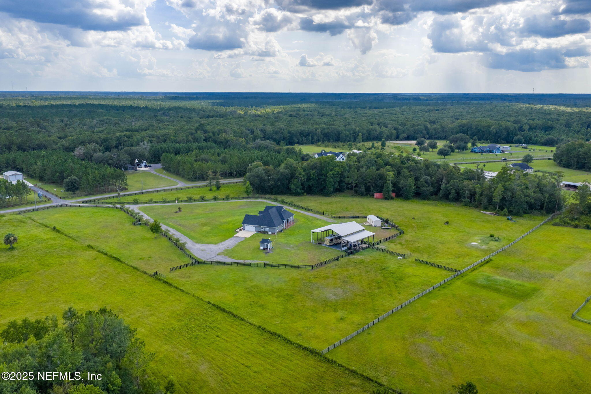 54515 Wildlife Way Callahan, FL 32011 - Photo 69 of 90 a view of a swimming pool and a yard