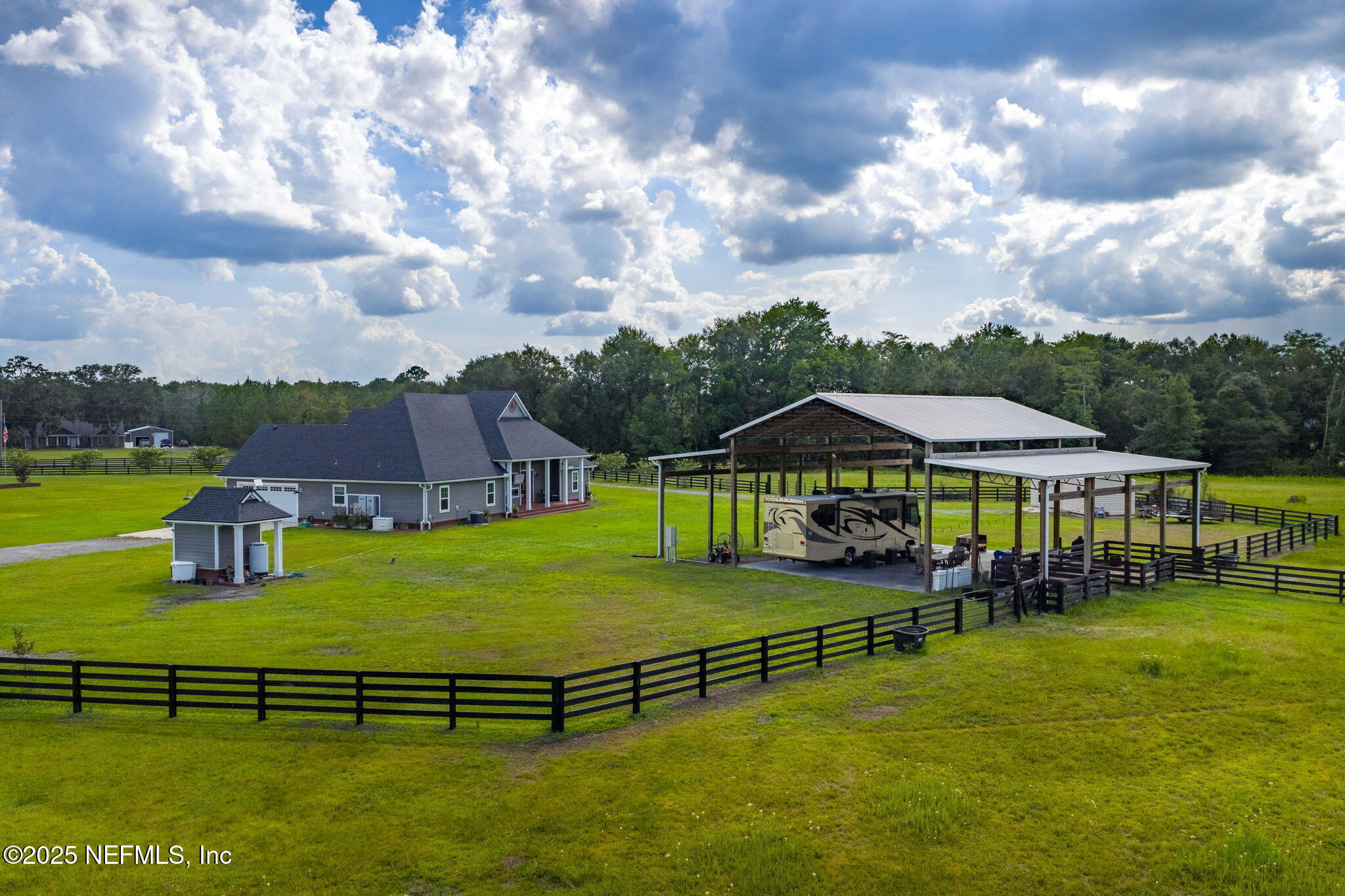 54515 Wildlife Way Callahan, FL 32011 - Photo 73 of 90 Rear view of home w/pole barn/pumphouse