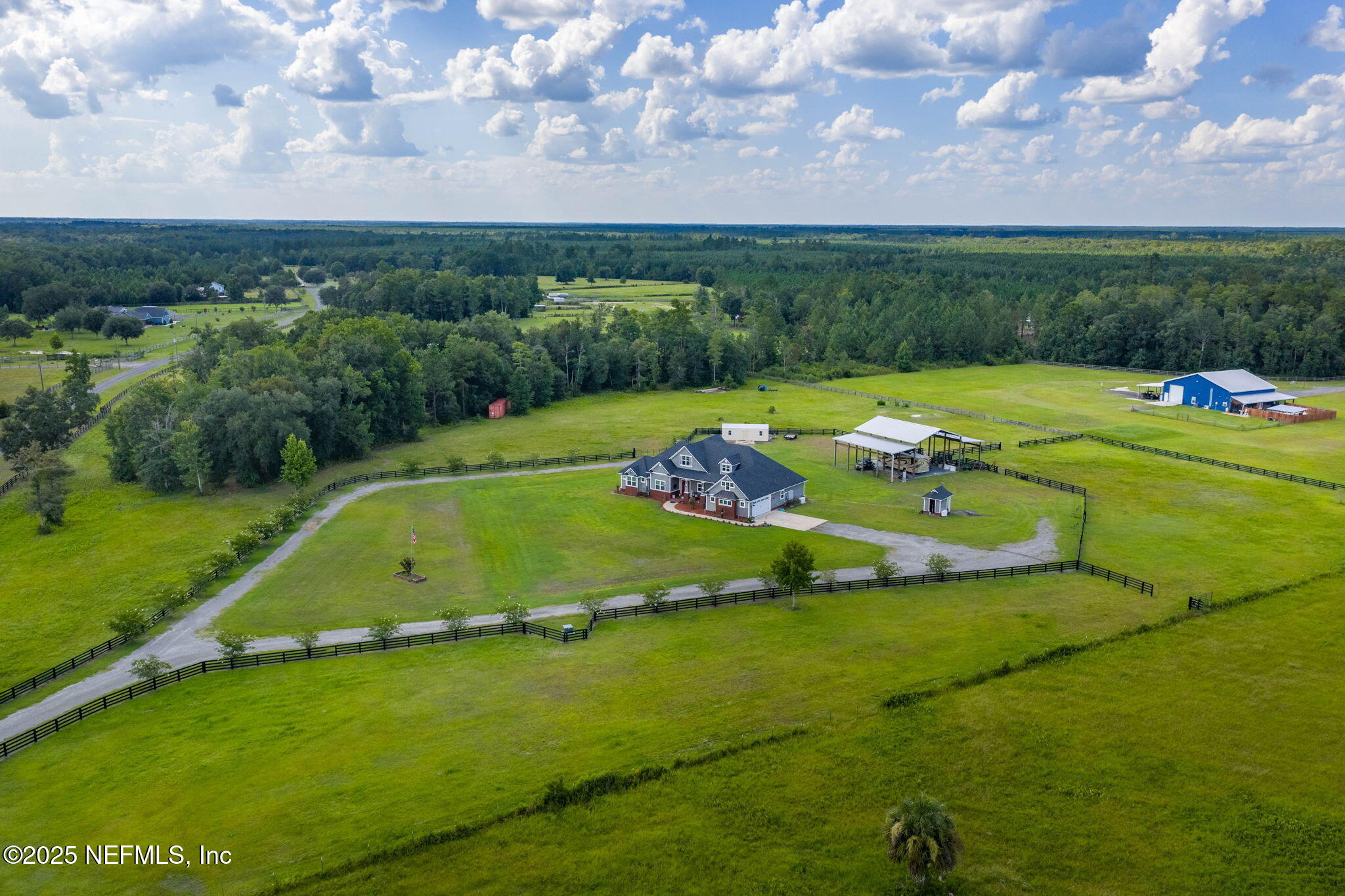 54515 Wildlife Way Callahan, FL 32011 - Photo 9 of 90 a view of a golf course with a garden