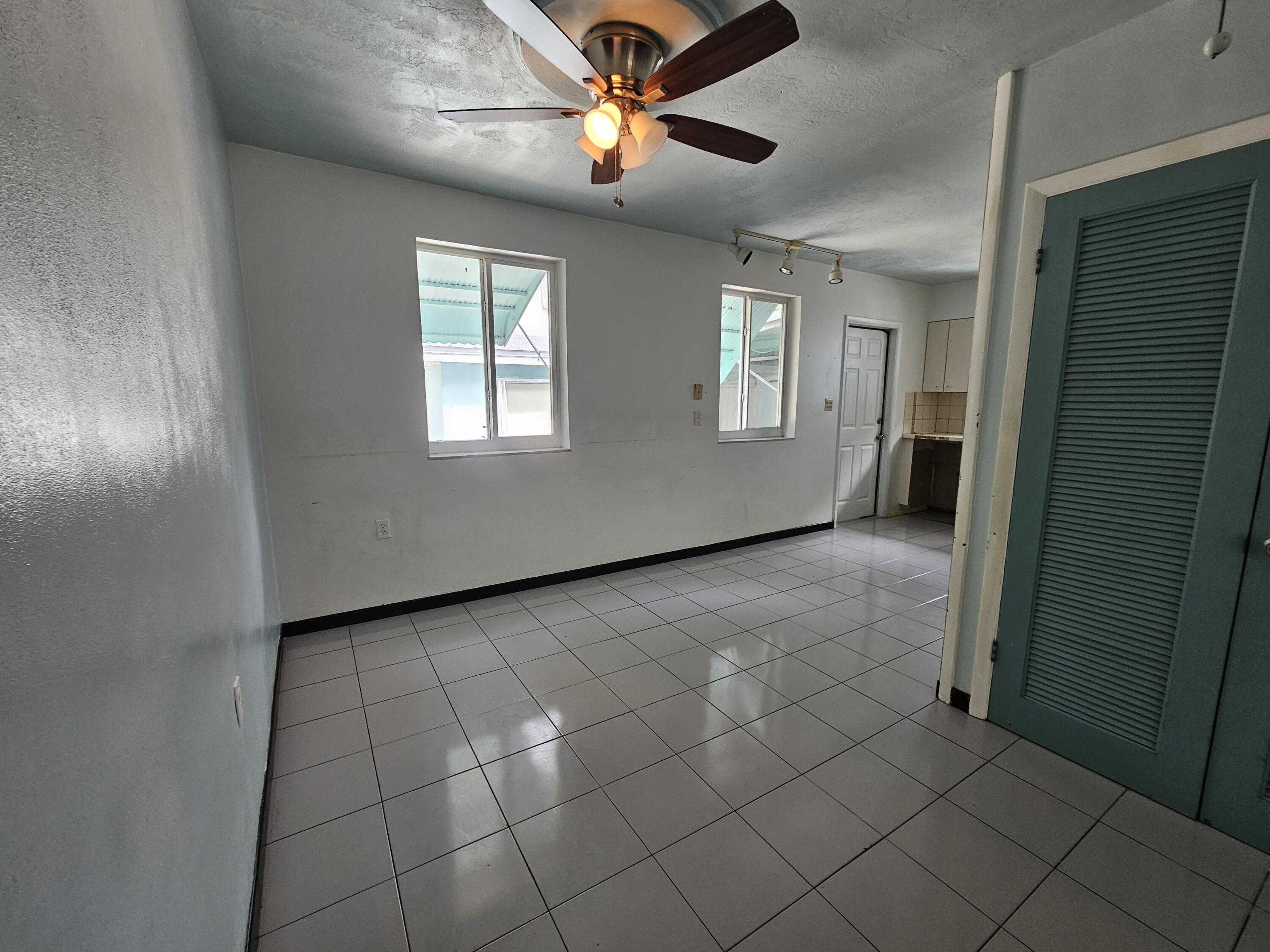 653 Colson Drive Key Largo, FL 33037 - Photo 7 of 30 Back door leads to screen porch