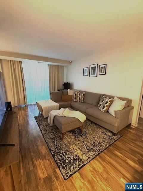 458 River, Unit C Nutley, NJ 07110 - Photo 1 of 15 a living room with a couch and a couch