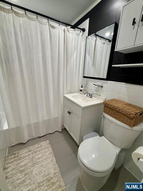 458 River, Unit C Nutley, NJ 07110 - Photo 12 of 15 a bathroom with a sink and a mirror