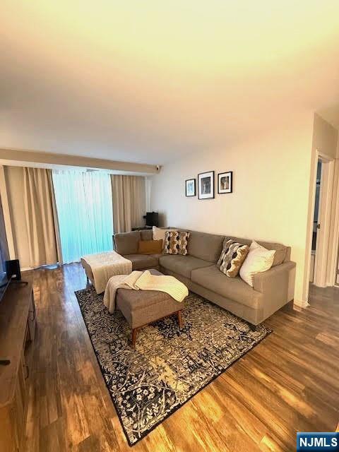 458 River, Unit C Nutley, NJ 07110 - Photo 3 of 15 a living room with furniture and a rug