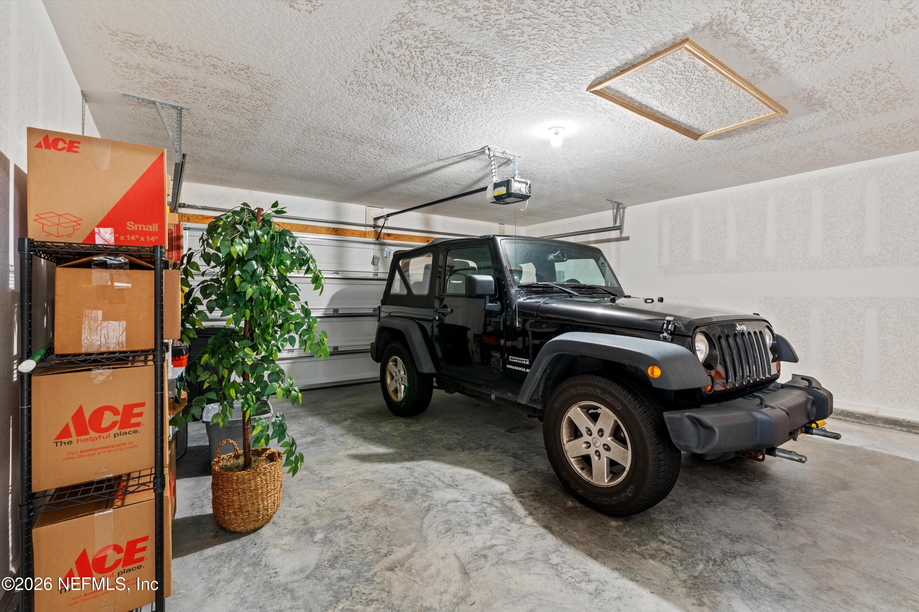 91 Rivertown Road Palm Coast, FL 32137 - Photo 29 of 36 29-Garage