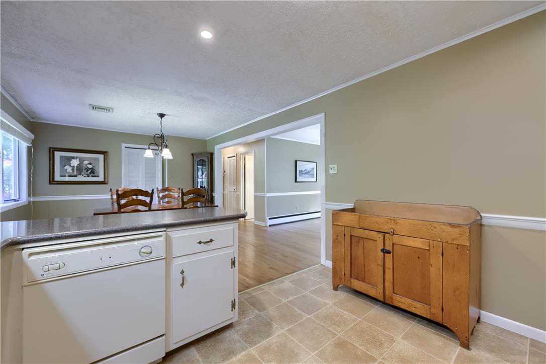 Coldsprings Rd Union Pottstown, PA 19465 - Photo 47 of 71 A well-appointed kitchen island with built-in appliances seamlessly connects to the dining space.
