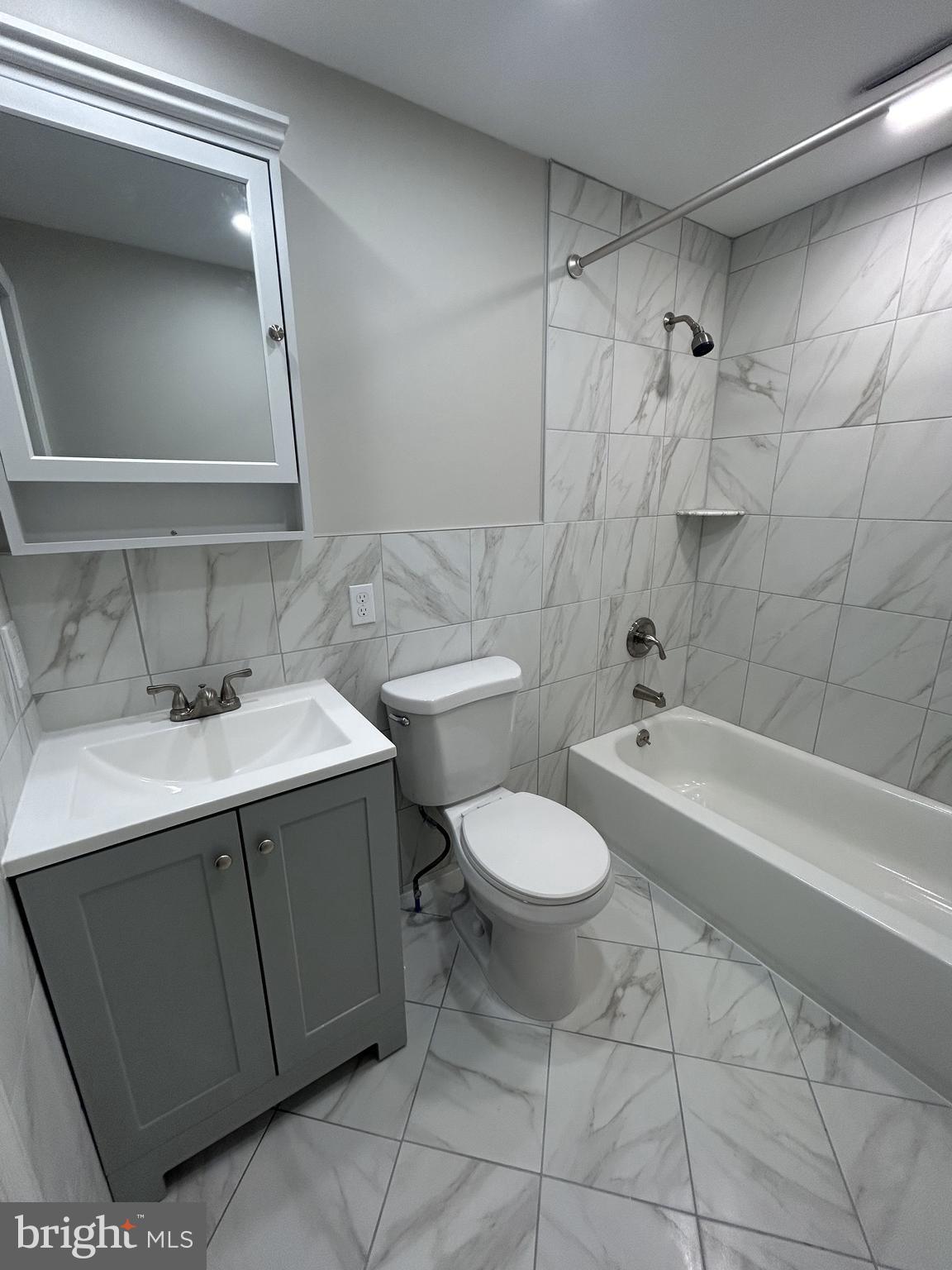 115 Bridge Street Spring City, PA 19475 - Photo 24 of 34 a bathroom with a sink toilet and shower