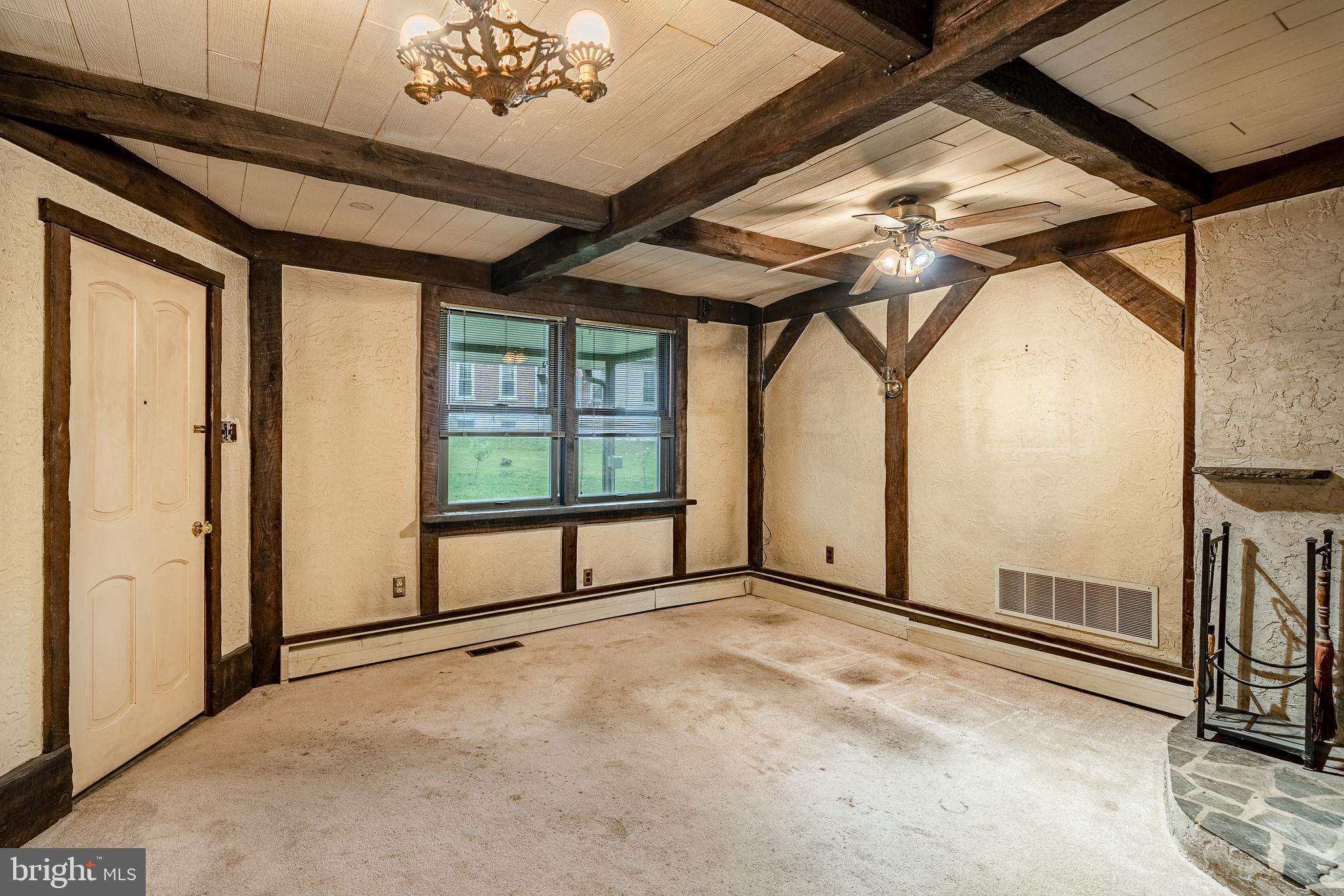 115 Bridge Street Spring City, PA 19475 - Photo 8 of 34 a view of an empty room with a window