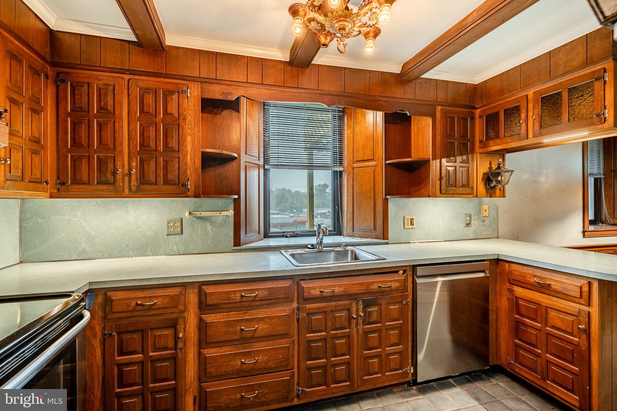 115 Bridge Street Spring City, PA 19475 - Photo 10 of 34 a kitchen with stainless steel appliances granite countertop a sink and cabinets