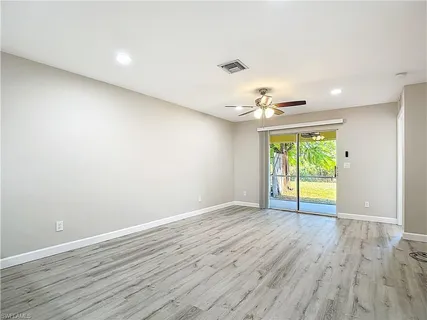 a view of an empty room and window