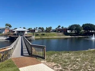 a view of a lake with a deck